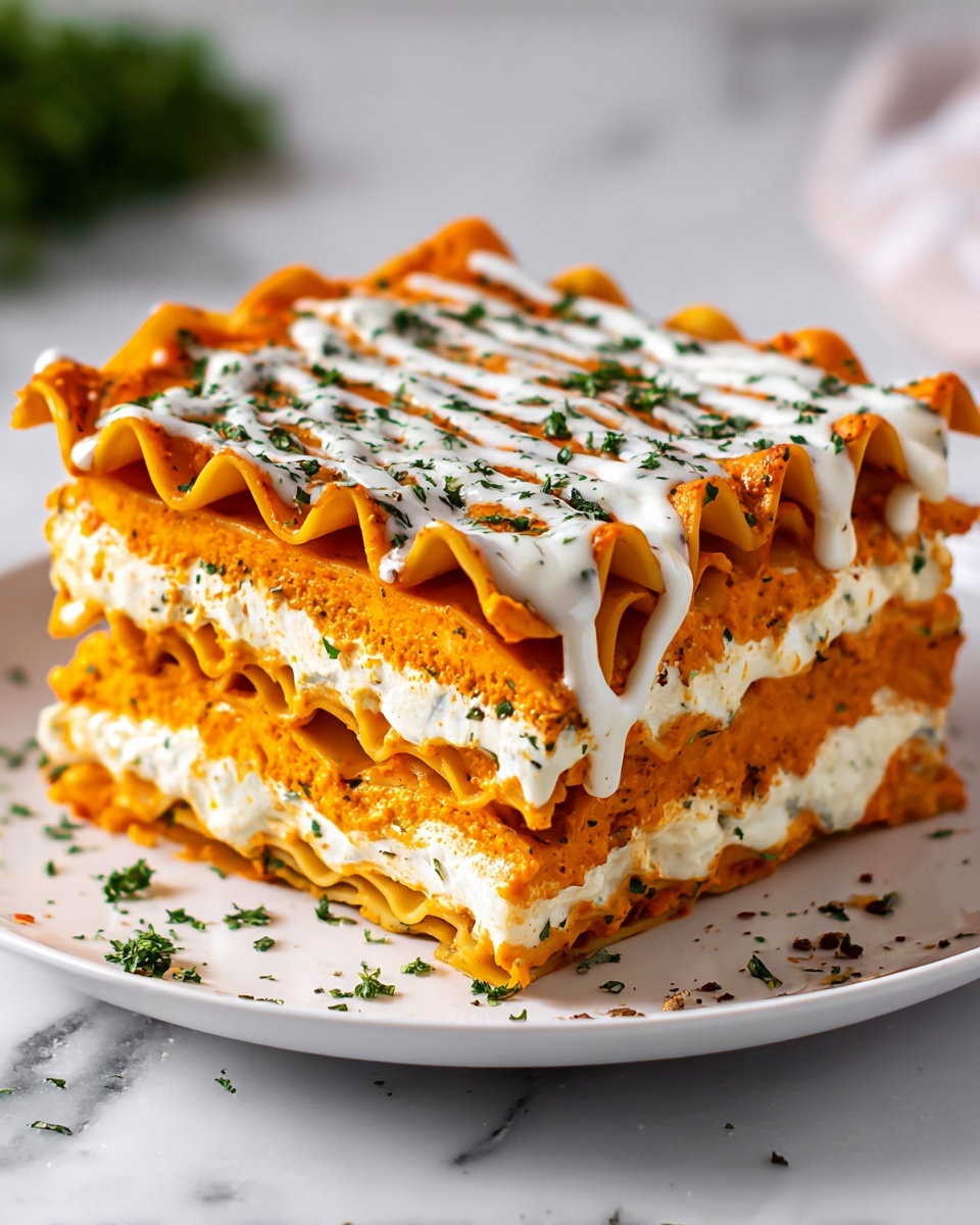 Cheesy Buffalo Chicken Lasagna with Ranch Drizzle Recipe - Recipe Image